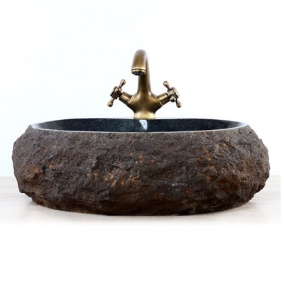 Fregadero de granito oscuro de Padang