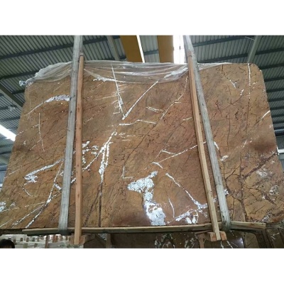 mármol marrón bidasar