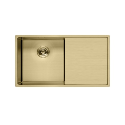 fregadero de cocina dorado claro con escurridor